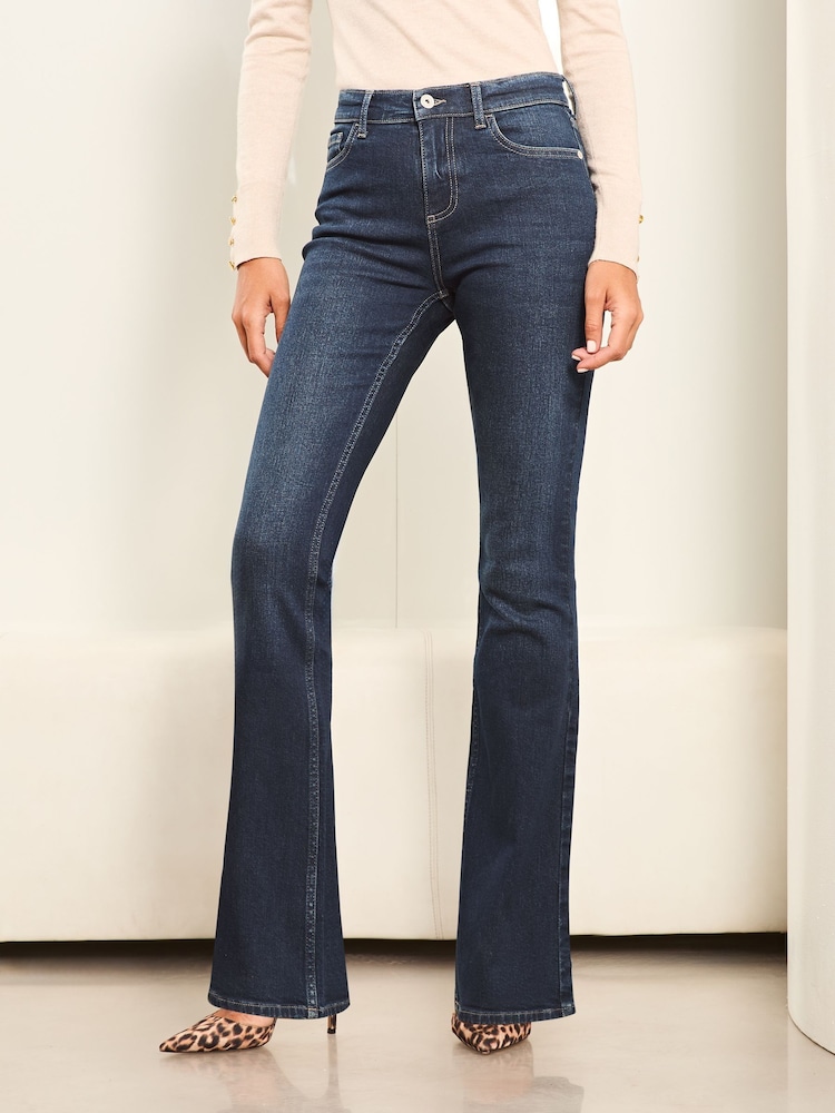 Lipsy Dark Blue Wash Petite Mid Rise Flare Jeans - Image 1 of 4
