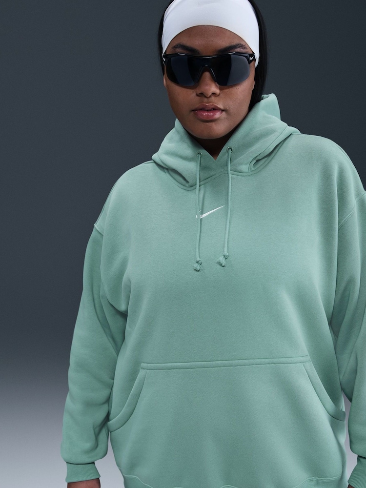 Azul Cannon - Sudadera deportiva oversize de polar con capucha Curve de Nike - Imagen 5 de 5