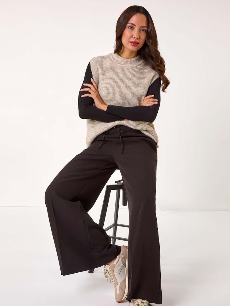 Pantalón de pierna ancha superelástico con lazo en el frente de Roman - Imagen 1 de 5 Pantalón de pierna ancha superelástico con lazo en el frente de Roman - Imagen 1 de 5