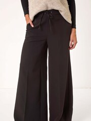 Pantalón de pierna ancha superelástico con lazo en el frente de Roman - Imagen 4 de 5