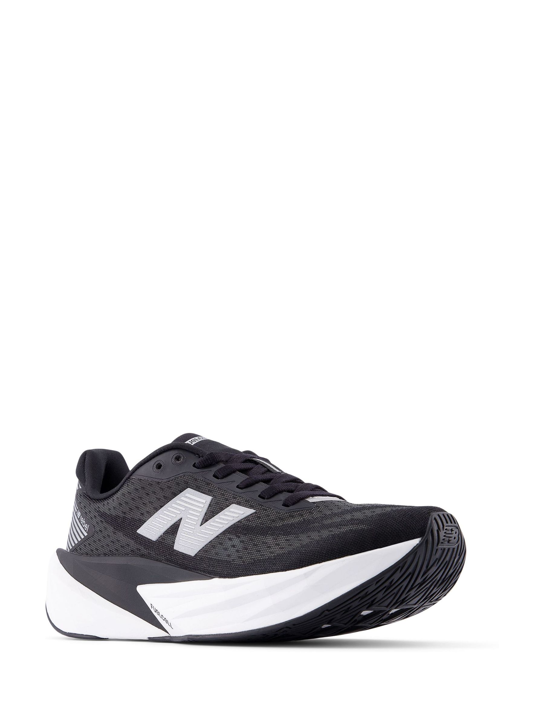 Buy New Balance Black/White Rebel v5 Running Trainers from Next USA