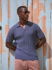 أزرق - Regular Fit Cotton Rich Short Sleeve Trophy Knit Polo Shirt - صورة 1 من 8
