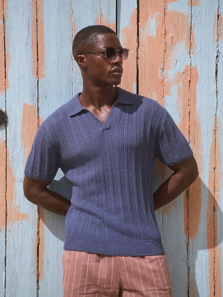 أزرق - Regular Fit Cotton Rich Short Sleeve Trophy Knit Polo Shirt - صورة 1 من 8