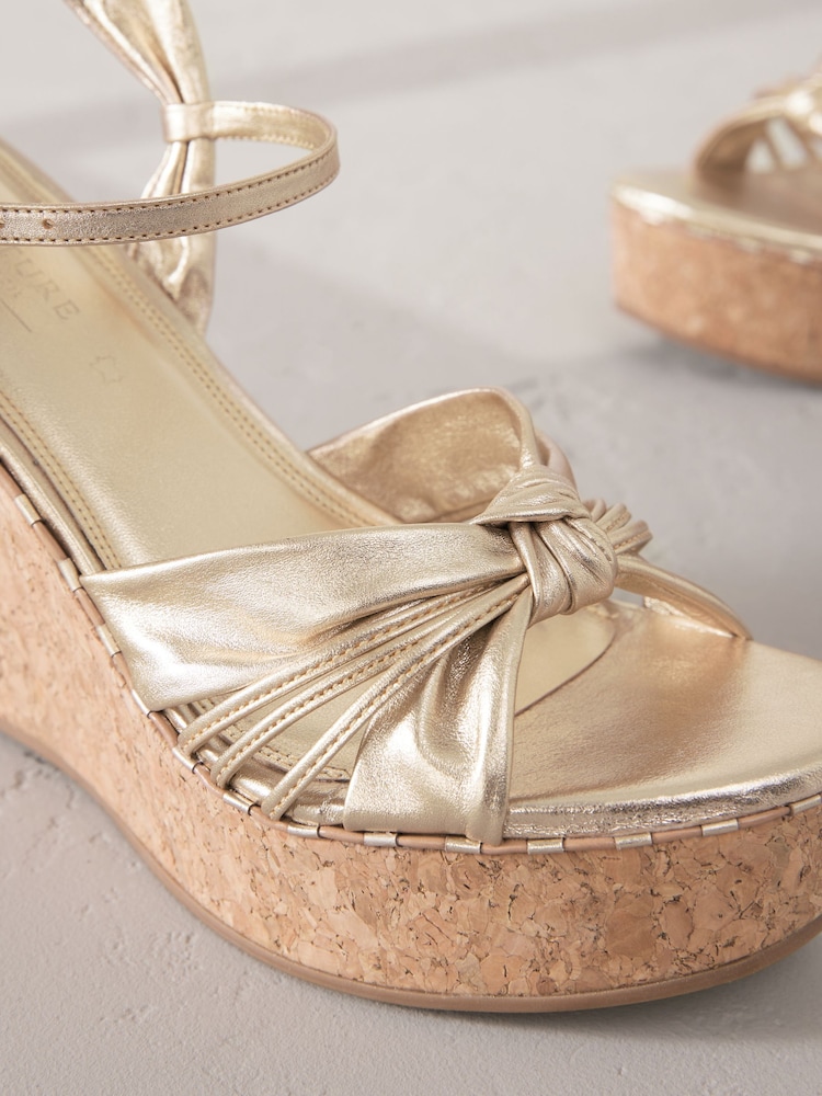 Buy Gold Signature Premium Leather Round Toe Twist Detail High Wedges from Next USA Buy Gold Signature Premium Leather Round Toe Twist Detail High Wedges from Next USA