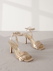 Gold Signature Premium Leather Fringe Tie Leg Heeled Sandals - Image 1 of 10