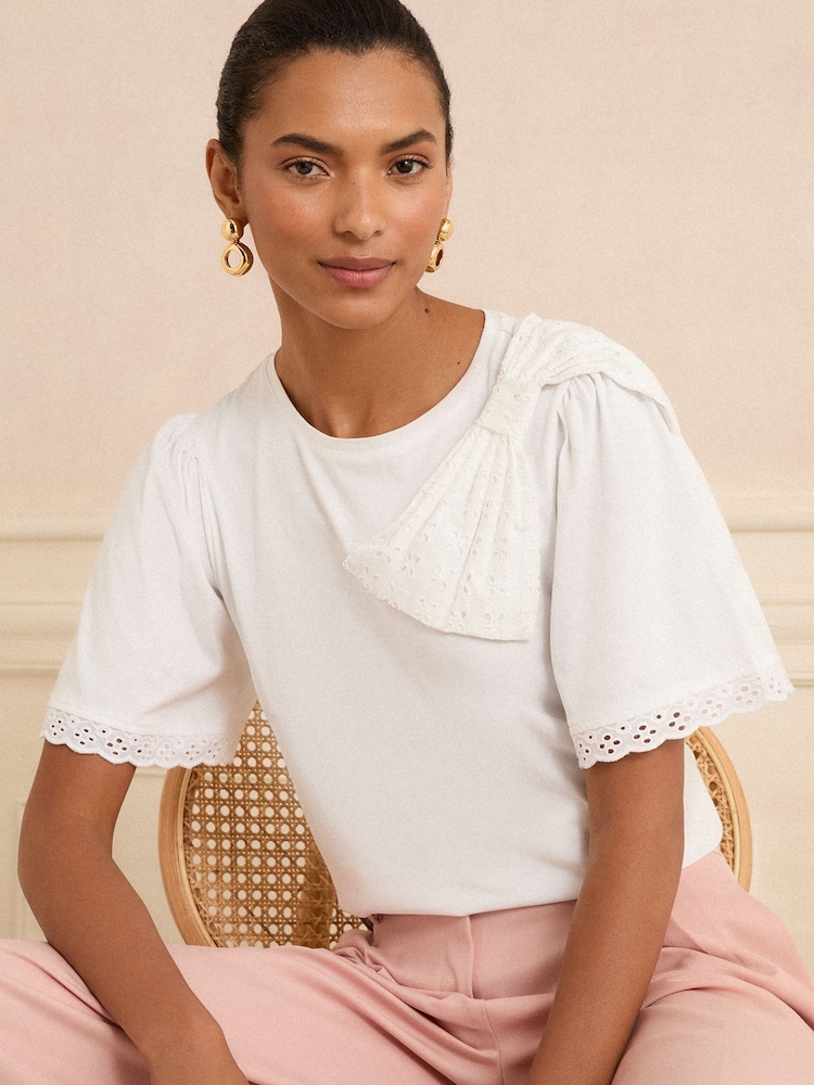 Love & Roses Ivory Broderie Bow Scallop Cuff Crew Neck T-Shirt - Image 1 of 4 Love & Roses Ivory Broderie Bow Scallop Cuff Crew Neck T-Shirt - Image 1 of 4