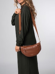 Pure Luxuries London 'Heidi' Leather Crescent Cross-Body Bag - Image 1 of 8