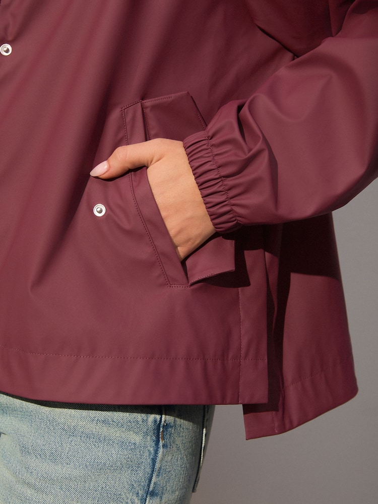 Buy Burgundy Rubber Rain Jacket from the Next UK online shop