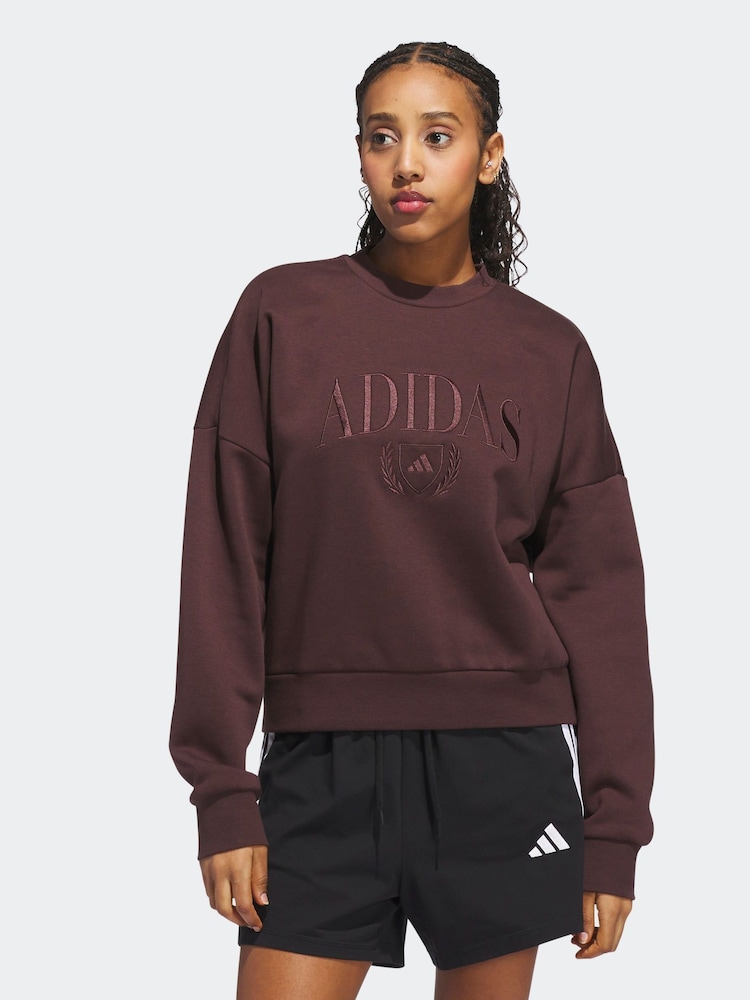 adidas Brown Cozy Holiday Logo Graphic Sweatshirt - Image 1 of 6 adidas Brown Cozy Holiday Logo Graphic Sweatshirt - Image 1 of 6