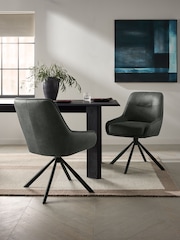 Grey Hamilton Black Leg Swivel Monza Faux Leather Dining Chairs - Image 1 of 8