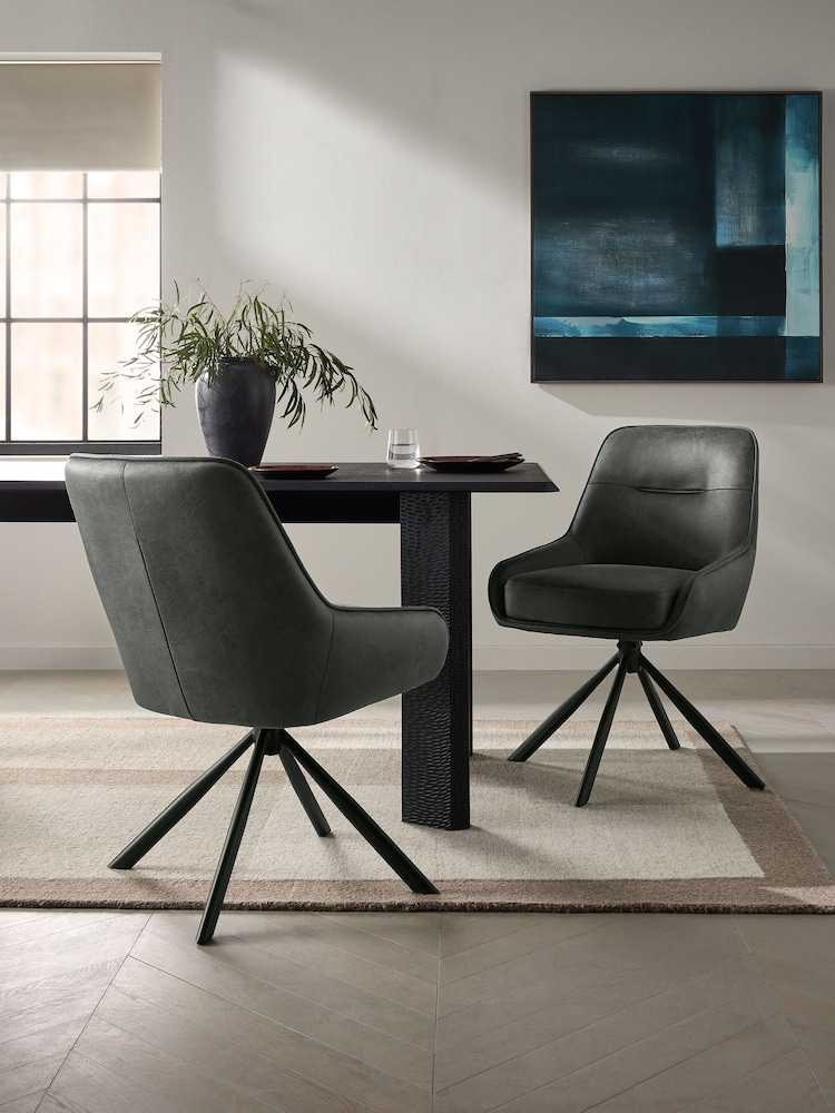 Grey Hamilton Black Leg Swivel Monza Faux Leather Dining Chairs - Image 1 of 8