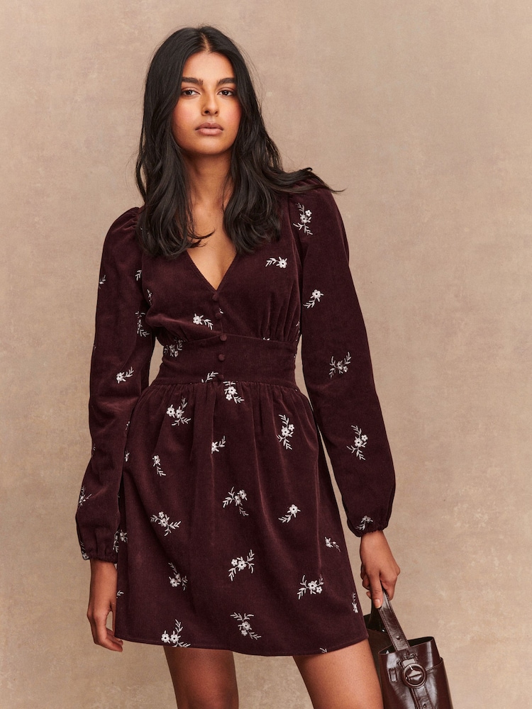 Burgundy Red/White Floral Mini Cord Long Sleeve Dress - Image 1 of 7 Burgundy Red/White Floral Mini Cord Long Sleeve Dress - Image 1 of 7