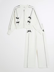 River Island Cream Girls Bow Bomber Sweat Set - Image 1 of 5