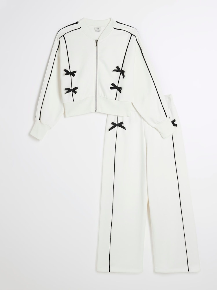 River Island Cream Girls Bow Bomber Sweat Set - Image 1 of 5 River Island Cream Girls Bow Bomber Sweat Set - Image 1 of 5