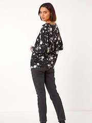Top elástico con hombros caídos y estampado floral de Roman - Imagen 3 de 5