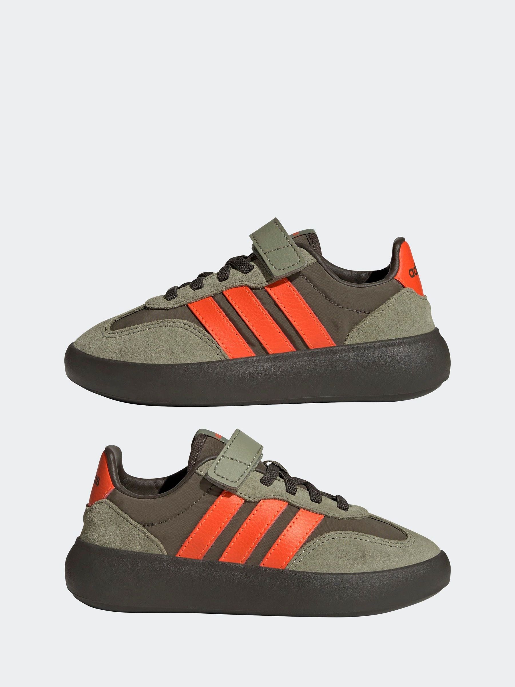 adidas shoes with orange stripes