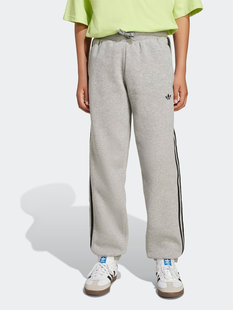 adidas Originals Grey Loose 3-Stripes Kids Joggers - Image 1 of 6 adidas Originals Grey Loose 3-Stripes Kids Joggers - Image 1 of 6
