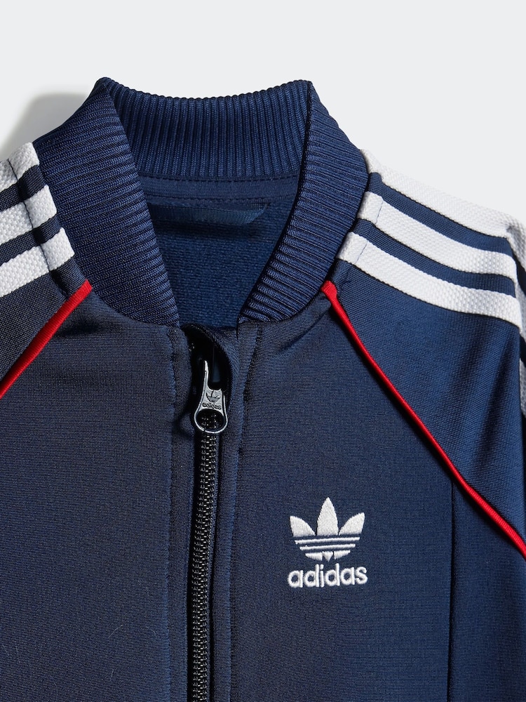 Buy adidas Originals Blue Adicolor SST Infant Kids Tracksuit from Next USA