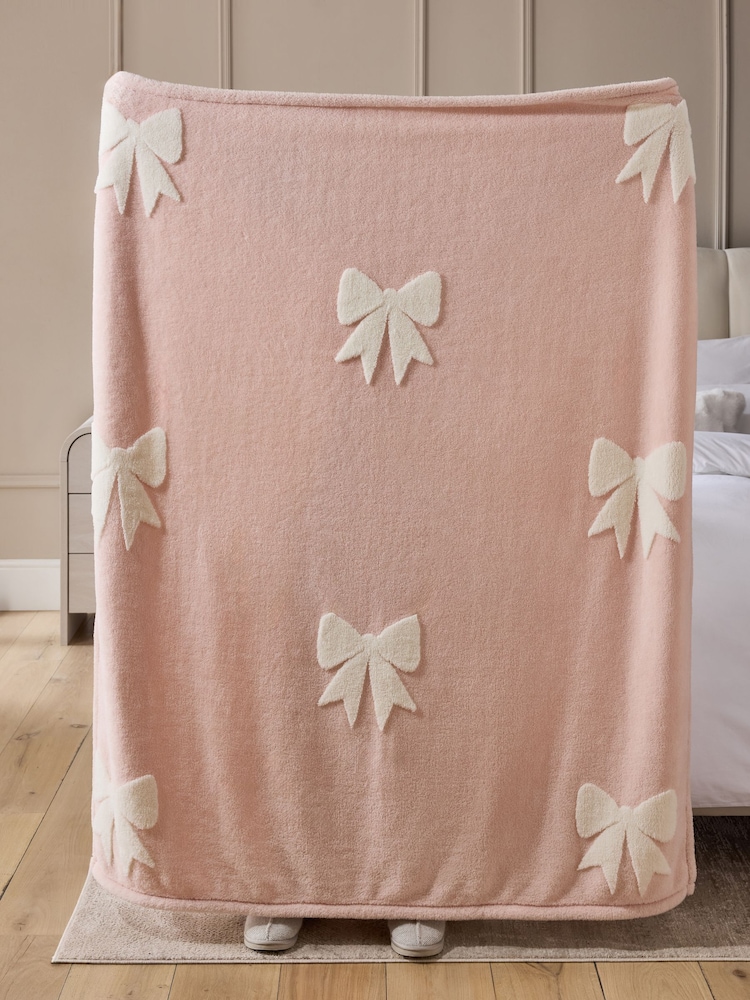 Buy Pink Carved Fleece Bows Throw from the Next UK online shop