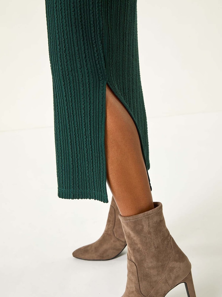 Grün - Roman – texturiertes Stretch-Midikleid mit V-Ausschnitt und Wellendesign - Bild 5 von 5