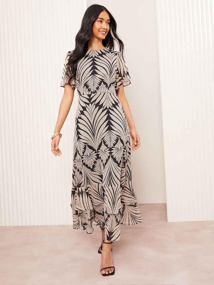 Schwarz - Friends Like These Short Sleeve Chiffon Tiered Maxi Dress - Bild 5 von 5 Schwarz - Friends Like These Short Sleeve Chiffon Tiered Maxi Dress - Bild 5 von 5