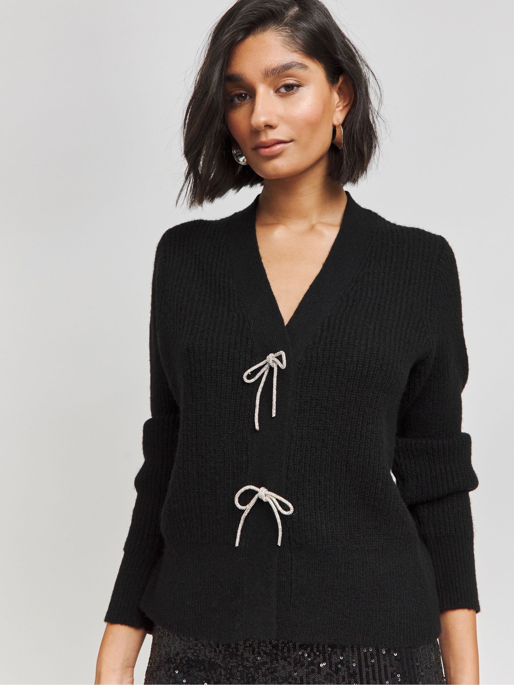 Buy Simply Be Black Diamante Bow Cardigan from Next Denmark