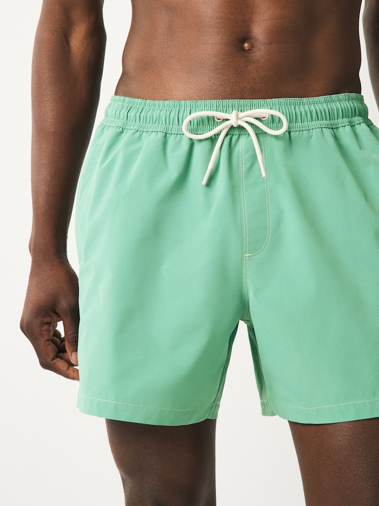 Sage Green Contrast Stitch Swim Shorts - Image 1 of 8 Sage Green Contrast Stitch Swim Shorts - Image 1 of 8