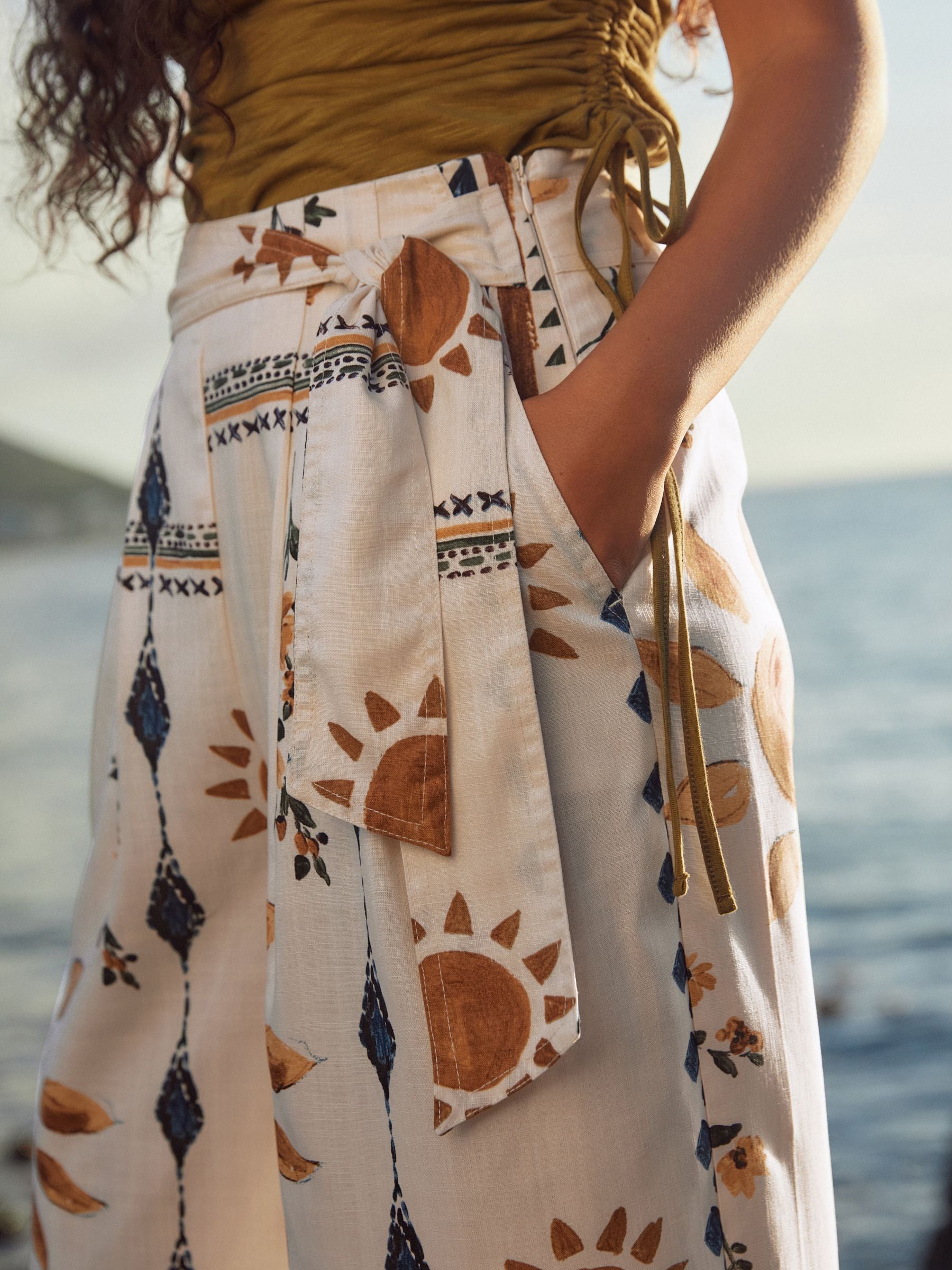 Buy Neutral Sunflower Print Tie Waist Wide Leg Trousers from the