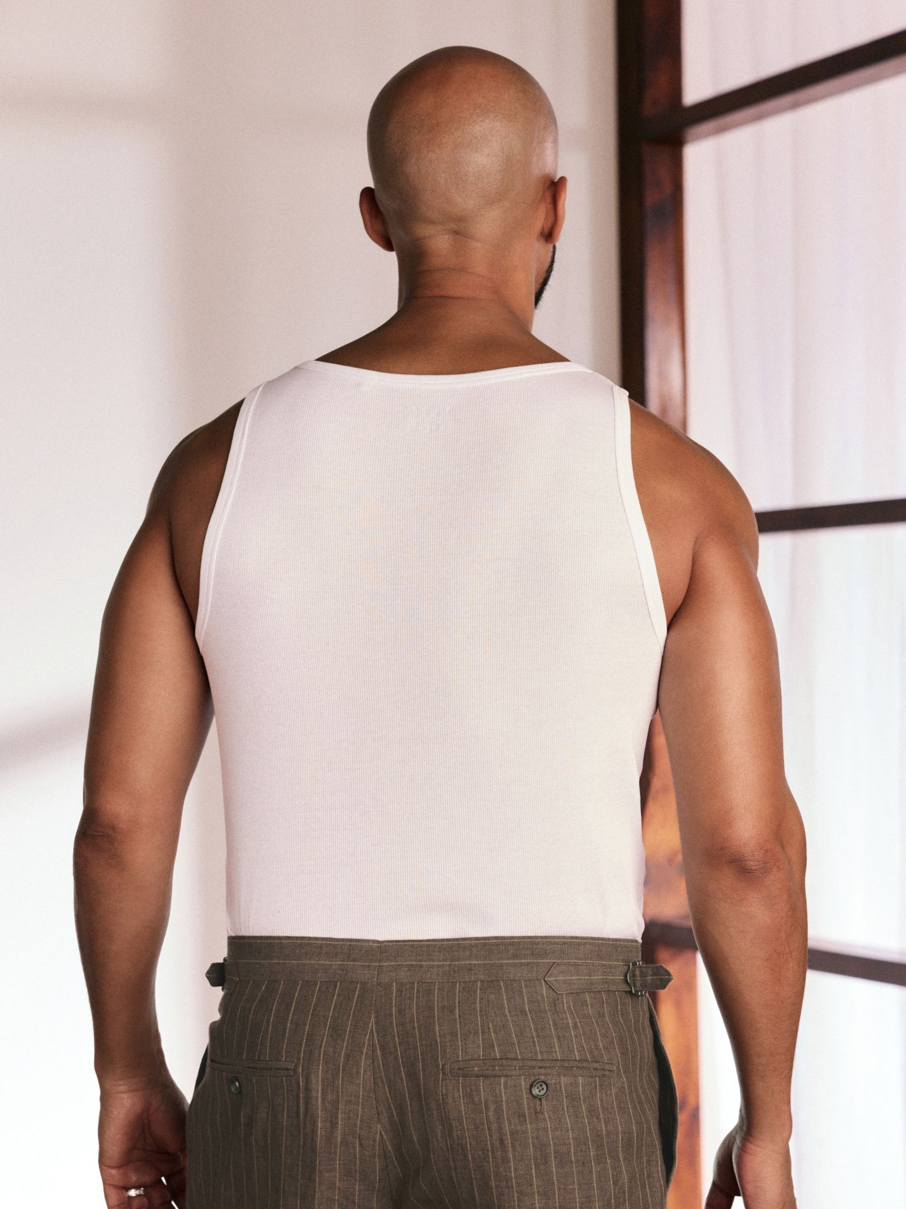 Buy White Slim Fit Ribbed Vests from Next Romania