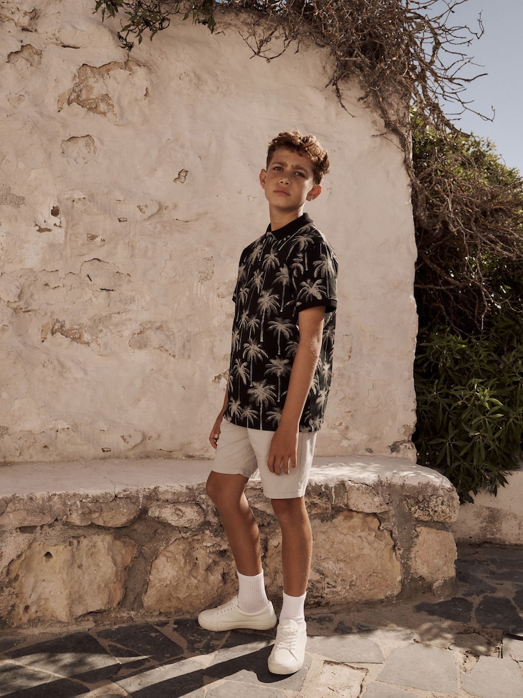 Negro con palmeras - All-Over Print Short Sleeve 100% Cotton Polo Shirt (3-16yrs) - Imagen 2 de 7 Negro con palmeras - All-Over Print Short Sleeve 100% Cotton Polo Shirt (3-16yrs) - Imagen 2 de 7
