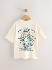 Crema con estampado trasero de palmera - Camiseta holgada de manga corta con estampado gráfico (3-16 años) - Imagen 5 de 7