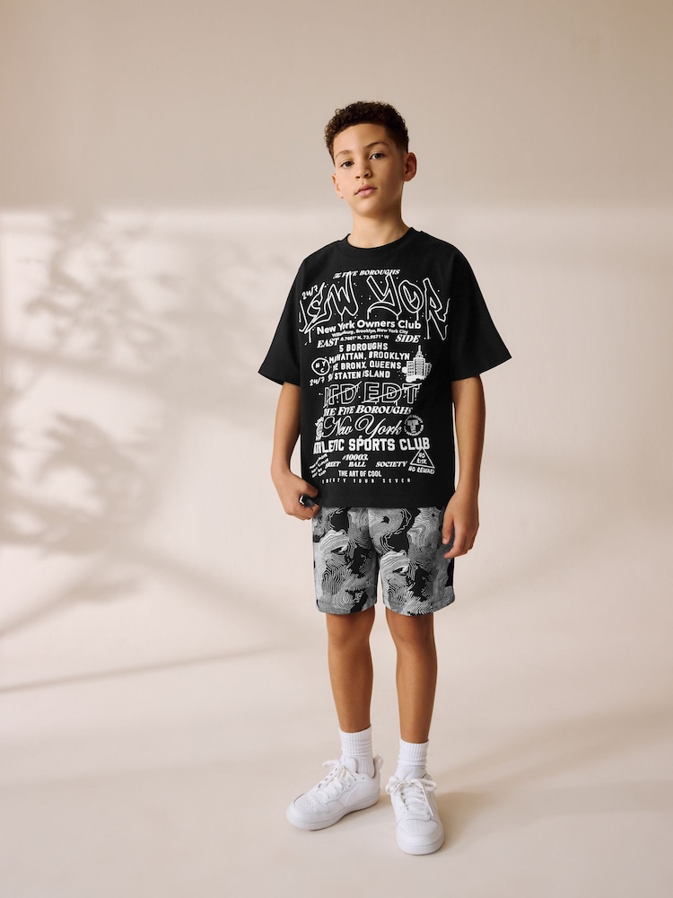 Black/White Graffiti Relaxed Fit Short Sleeve T-Shirt and Shorts Set (3-16yrs) - Image 1 of 8