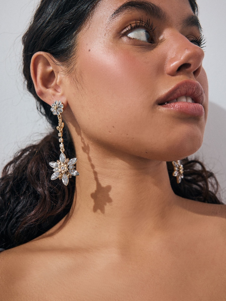 Gold Tone Flower Sparkle Long Drop Earrings - Image 1 of 5