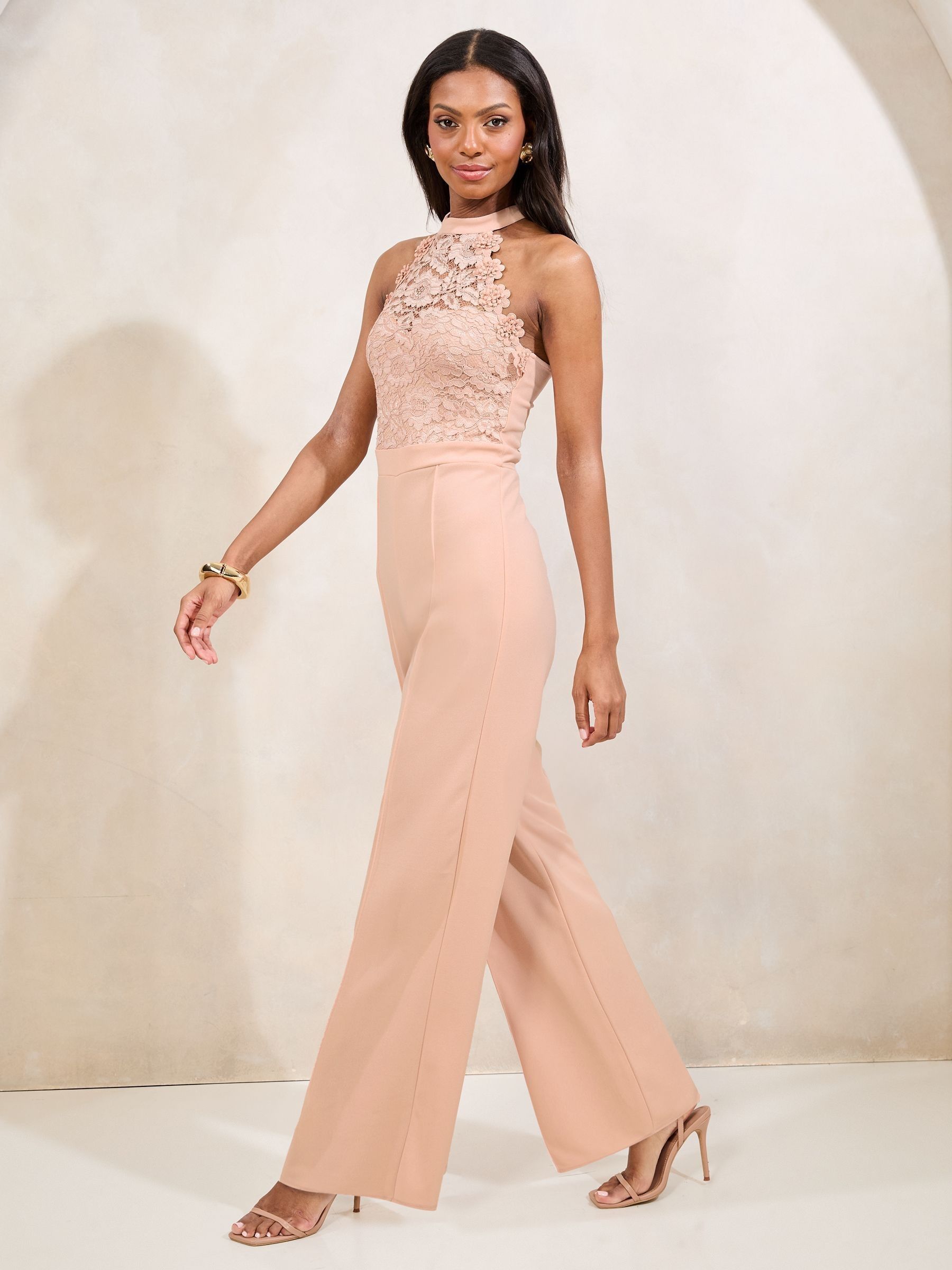Buy Lipsy Nude Pink Halter Lace Mix Flower Trim Jumpsuit from Next