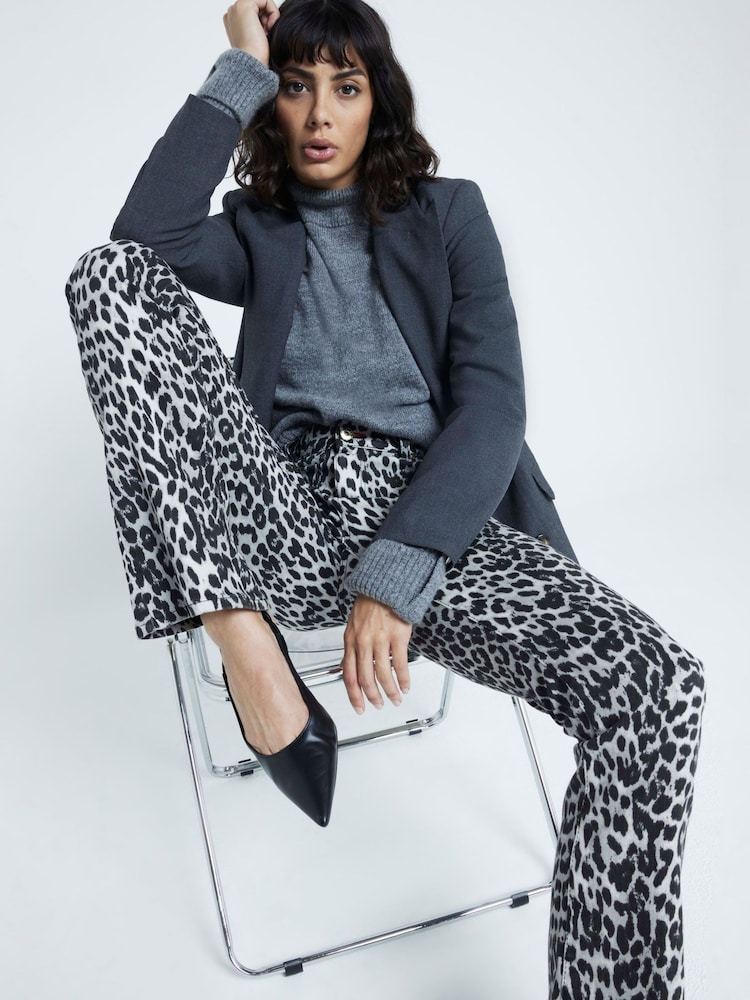 River Island Black High Rise Leopard Print Bootcut Jeans - Image 1 of 4 River Island Black High Rise Leopard Print Bootcut Jeans - Image 1 of 4