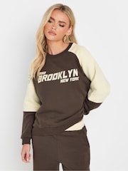PixieGirl Petite Chocolate Brown Brooklyn Slogan Sweatshirt - Image 1 of 5