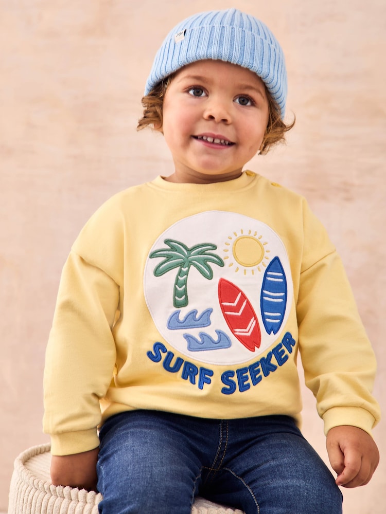 Surf amarillo - JoJo Maman Bébé 100% Cotton Appliqué Sweatshirt - Imagen 1 de 8 Surf amarillo - JoJo Maman Bébé 100% Cotton Appliqué Sweatshirt - Imagen 1 de 8