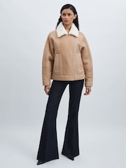 Paige Angled-Waist Flared Jeans - Image 1 of 8