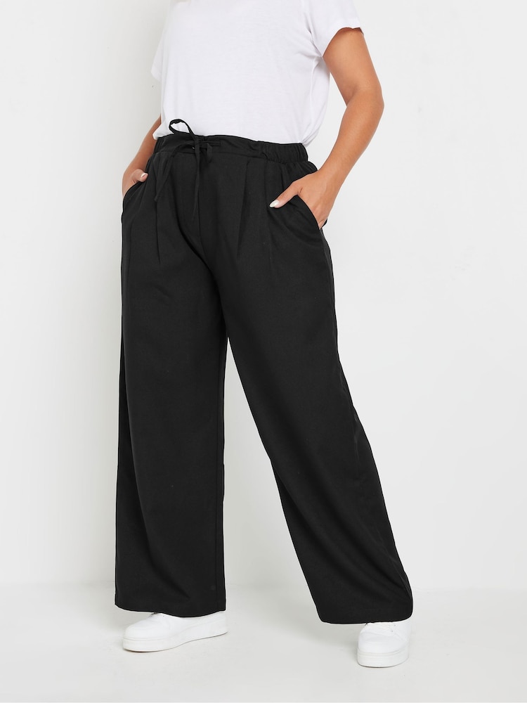 Yours Curve Black Woven Wide Leg Trousers - Image 1 of 5 Yours Curve Black Woven Wide Leg Trousers - Image 1 of 5