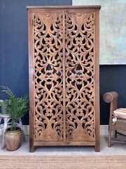 Kirei Home Natural Intricate Hand Carved Mango Wood Double Cabinet - Image 1 of 6