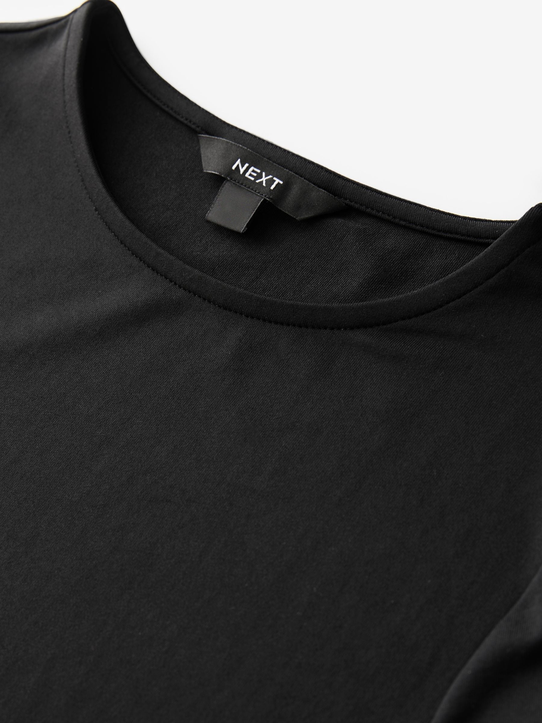 Buy Black Soft Touch Slinky Nylon Crew Neck Long Sleeve Top from