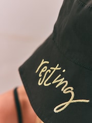 Rockett St George Black/Gold Resting Beach Face Bucket 100% Cotton Hat - Image 7 of 12