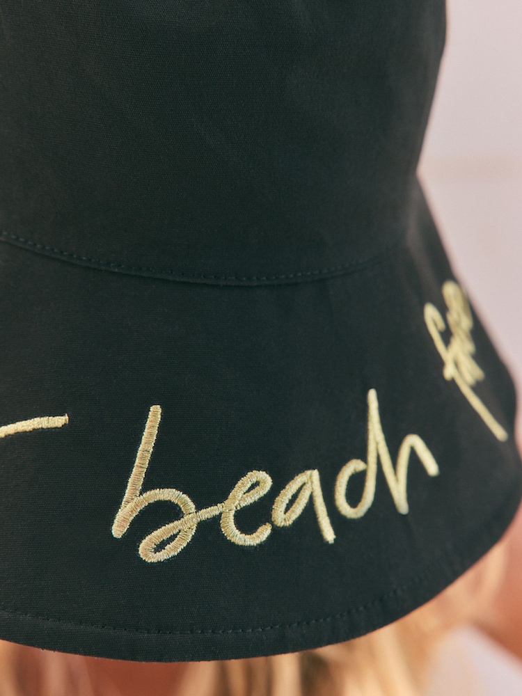 Rockett St George Black/Gold Resting Beach Face Bucket 100% Cotton Hat - Image 8 of 12
