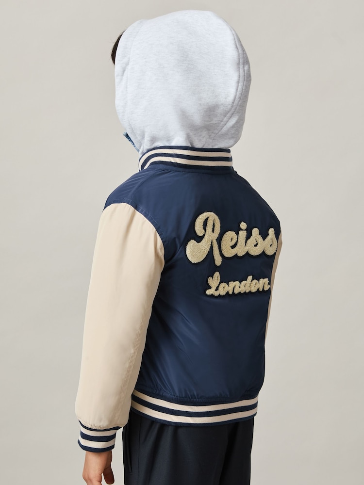 jakna s kapuco Varsity Reiss Fred Logo Patch; suknjič - Slika 1 iz 6 jakna s kapuco Varsity Reiss Fred Logo Patch; suknjič - Slika 1 iz 6