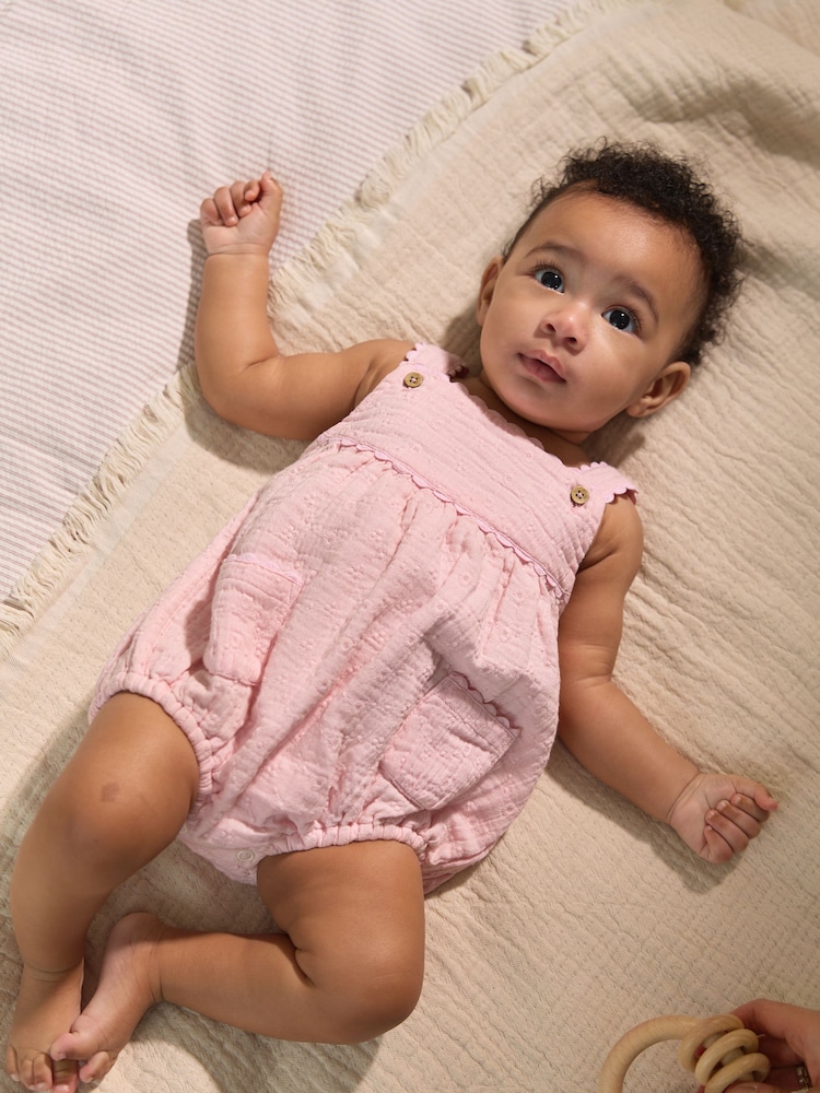 Pink Baby Broderie Romper (0mths-3yrs) - Image 1 of 3