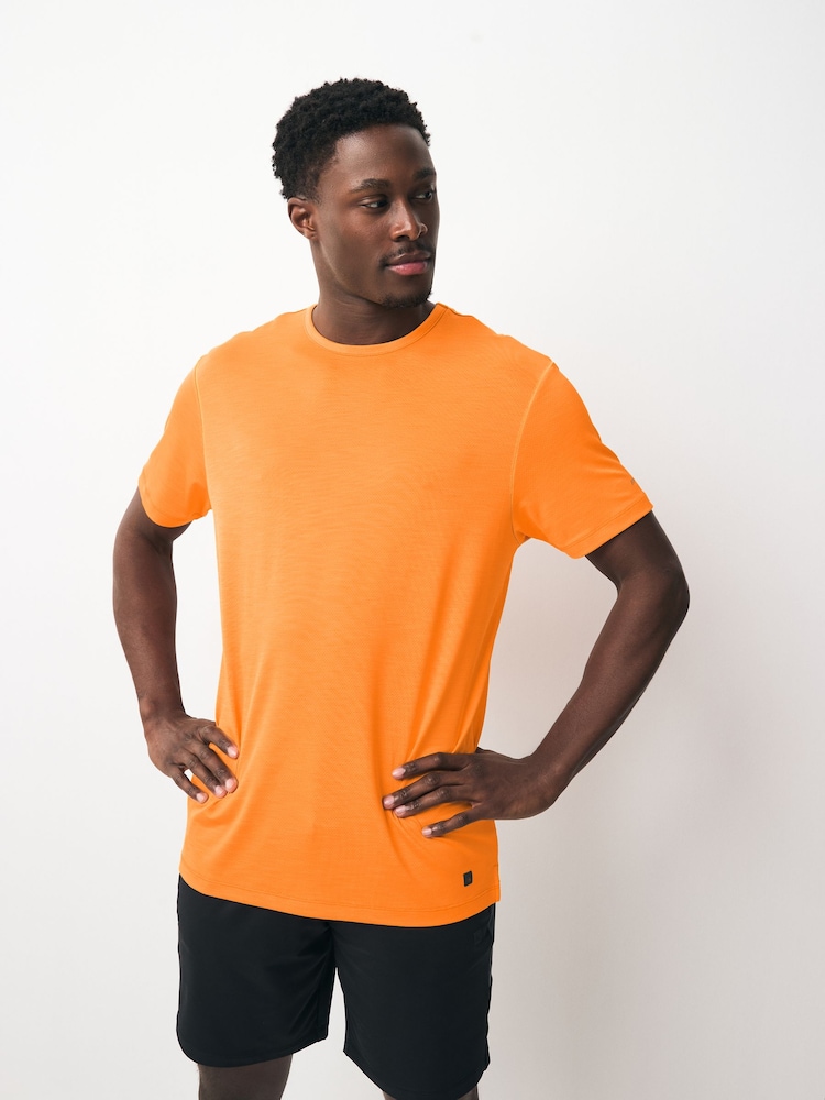 Naranja - Camiseta deportiva de entrenamiento de Active Gym - Imagen 1 de 7 Naranja - Camiseta deportiva de entrenamiento de Active Gym - Imagen 1 de 7