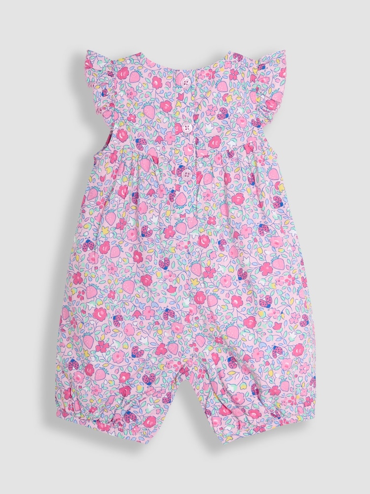 Rosa mit aufgesetzten Erdbeer-Taschen - JoJo Maman Bébé – hübscher, bestickter Sonnenschutz-Anzug mit Rüschen an der Schulter aus 100 % Baumwolle - Bild 2 von 3