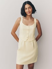 Buttermilch-Gelb - Ärmelloses Minikleid im Westen-Stil aus 100 % Baumwolle - Image 1 of 6
