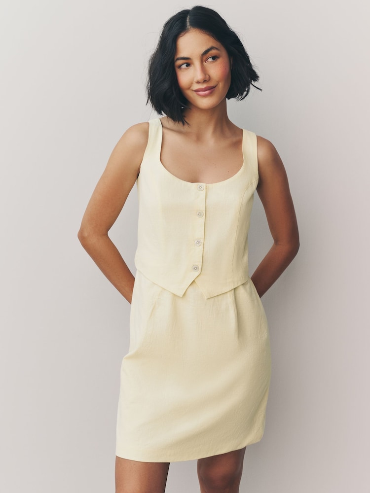 Buttermilch-Gelb - Ärmelloses Minikleid im Westen-Stil aus 100 % Baumwolle - Image 1 of 6