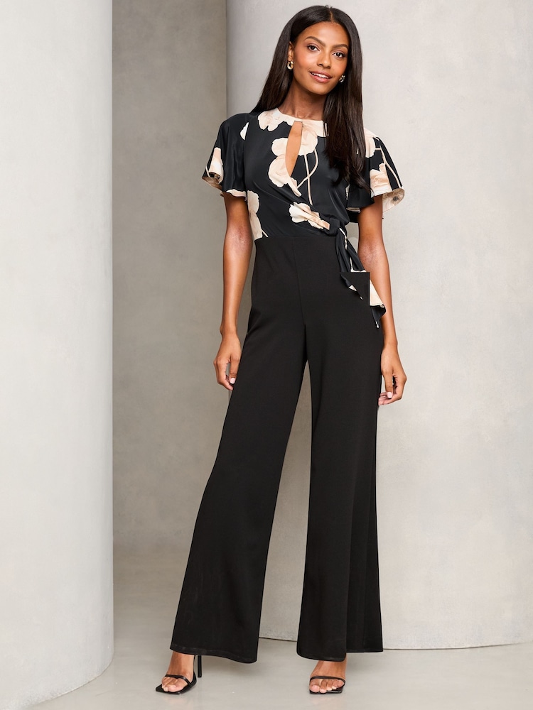 Lipsy Black Flutter Sleeve Tie Side Wide Leg Jumpsuit - Image 1 of 4